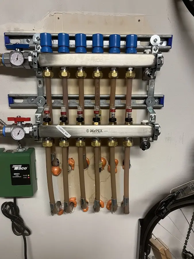 Plumber performing Gas Leak Detection at a residential property in Hopkinton